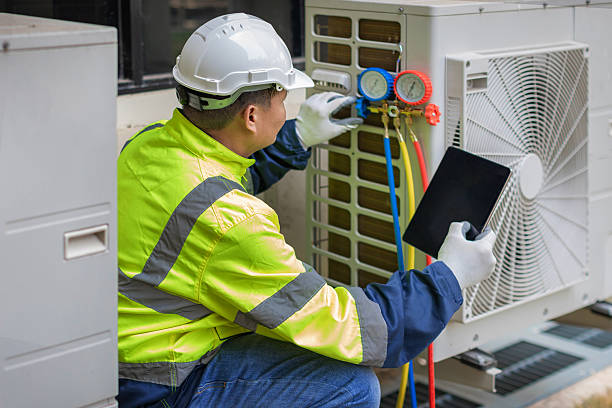 Professional Heat Pump Repair technician working in Notasulga, AL